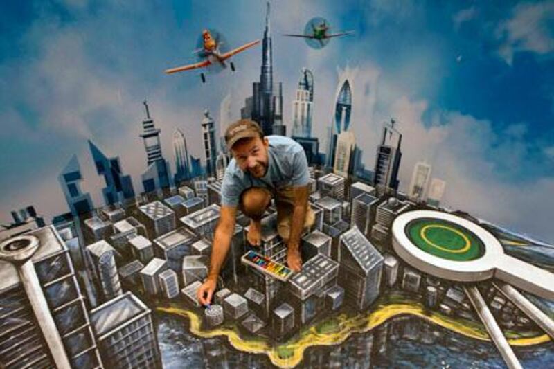 Dubai, United Arab Emirates, Aug 30, 2013 - Artist  Joe Hill pose for a photo over his 3D painting  at the The Toy Store in Dubai Mall. ( Jaime Puebla / The National Newspaper ) Ramola