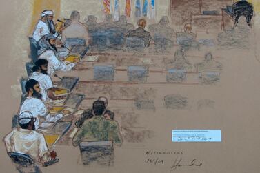 This Wednesday, Jan. 21, 2009 sketch reviewed by the US military, shows, from top left, Khalid Shaikh Mohammad; Walid bin Attash; Ramzi bin al Shibh; Ali Abdul Aziz Ali, also known as Ammar al Baluchi, and Mustafa al Hawsawi attend a hearing at the US Military Commissions court for war crimes at Guantanamo Bay, Cuba. AP Photo