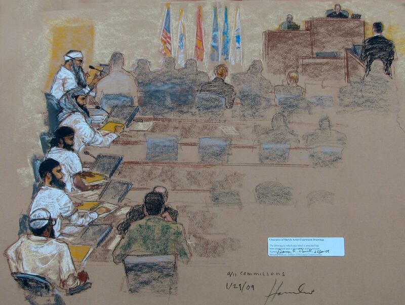 In this photo of a sketch by court artist Janet Hamlin, and reviewed by the U.S. Military, from top left to bottom, Khalid Sheik Mohammed, Walid bin Attash, Ramzi bin al Shibh, Ali Abdul Aziz Ali, also known as Ammar al Baluchi, and Mustafa al Hawsawi attend a hearing at the U.S. Military Commissions court for war crimes at the U.S. Naval Base in Guantanamo Bay, Cuba, Wednesday, Jan. 21, 2009. The new Obama administration circulated a draft executive order Wednesday that calls for closing the U.S. detention center at Guantanamo Bay within a year and halting any war crimes trials in the meantime. (AP Photo/Janet Hamlin, Pool)