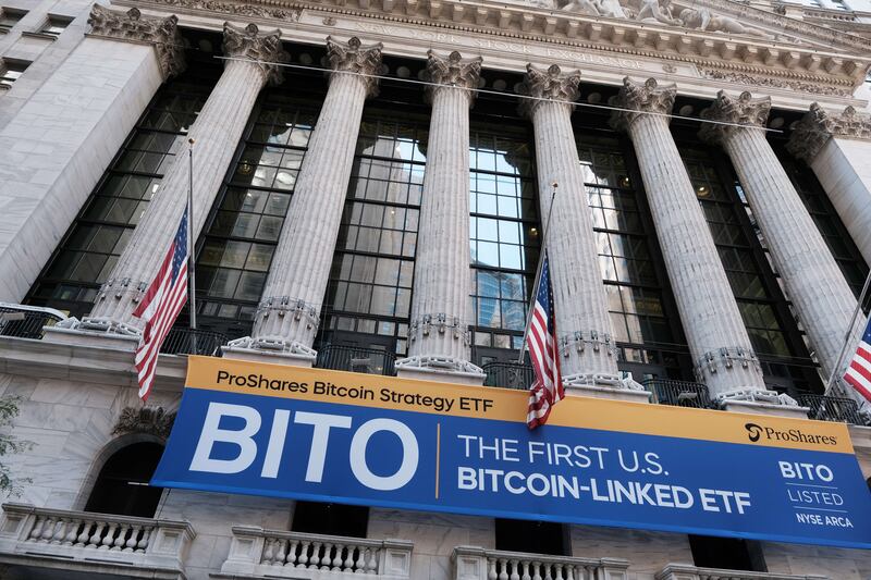 A banner for the first listed Bitcoin-linked exchange-traded fund in the US hangs outside the New York Stock Exchange. AFP