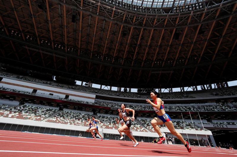 Japan's Ayumi Kaneko, Sae Miyazono, Haruna Oota, Riko Sonomiya and Midori Mikase compete in the women's 100m round 1 heat during the morning session of the athletics test event. Reuters