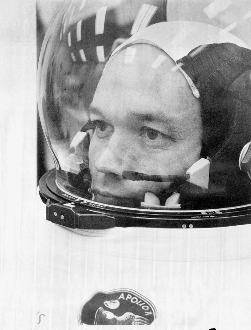Astronaut Michael Collins prepares to board on Apollo 11 for the beginning of a mission to the moon 16 July 1969. AFP PHOTO NASA (Photo by NASA / NASA / AFP)