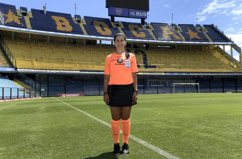 To mark the occasion of International Women's Day on March 8, 2018 AFP presents a series of 45 photos depicting women performing roles or working in professions more traditionally held by men.  More images can be found in www.afpforum.com  Search SLUG  "WOMEN-DAY -PACKAGE". 
Argentine referee Estela Alvarez de Olivera, who turns 40 on March 2, poses at the Boca Juniors football team stadium "La Bombonera", in Buenos Aires on February 27, 2018.
In the ring, battling flames or lifting off into space, women have entered professions generally considered as men's jobs. For International Women's Day, AFP met with women breaking down the barriers of gender-bias in the work world. / AFP PHOTO / Juan MABROMATA