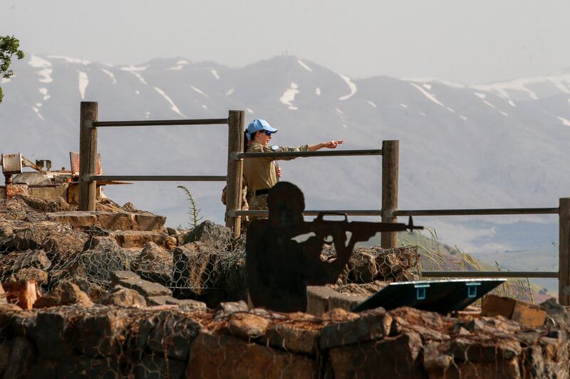 Members of the United Nations Disengagement Observer Force monitor the Syrian side of the border with Israel in the Israeli-occupied Golan Heights. AFP