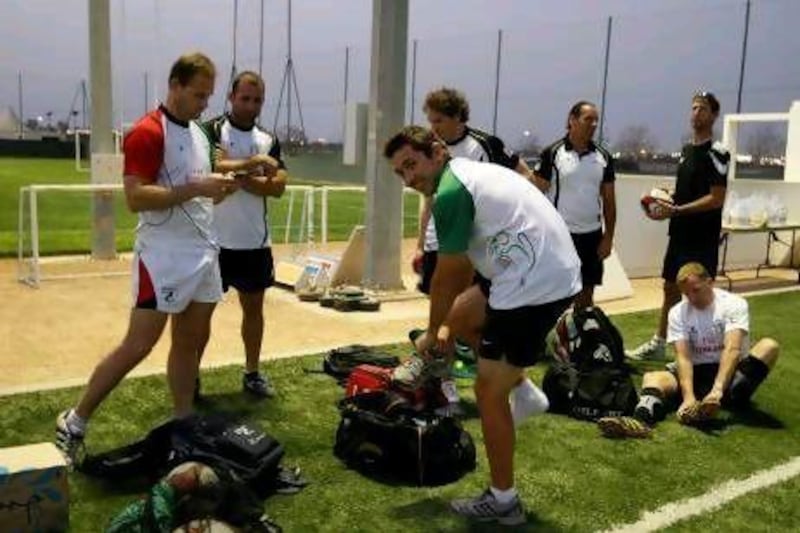 Andy Russell, centre, returns to the UAE squad after snapping his bone during his debut against Hong Kong in April. Mike Young / The National