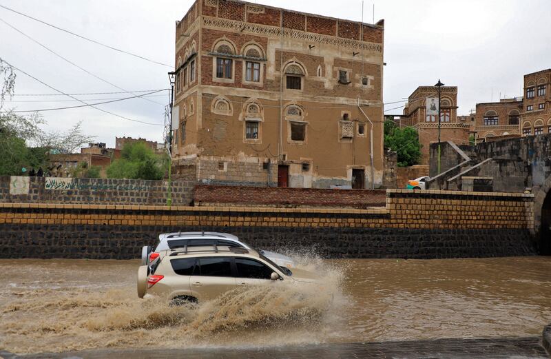Travelling through the city by car was still possible, despite the deep lying water. AFP