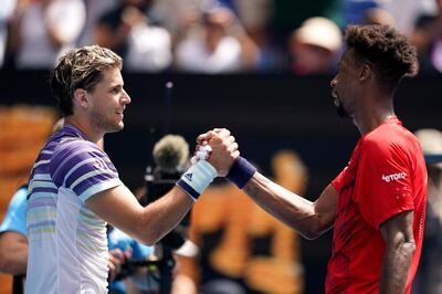 epa08169030 Dominic Thiem (L) of Austria shakes hands with Gael Monfils (R) of France after their fourth round match at the Australian Open tennis tournament at Melbourne Park in Melbourne, Australia, 27 January 2020.  EPA/NATASHA MORELLO AUSTRALIA AND NEW ZEALAND OUT  EDITORIAL USE ONLY