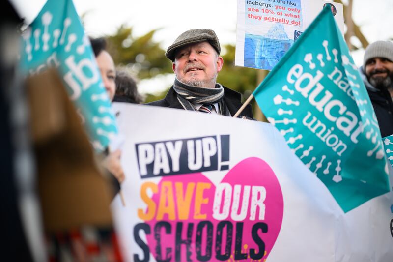 Teachers strike outside Bishop Thomas Grant school in London. PA