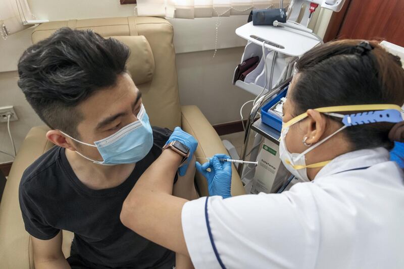 Covid-19 inoculations start in Dubai for Chinese nationals on visit visas to the UAE at the Al Safa Health Centre in Dubai on May 27th, 2021. Chinese National Chen Gang gets his shot.
Antonie Robertson / The National.
Reporter: Ramola Talwar for National.