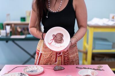 DUBAI, UNITED ARAB EMIRATES - May 30 2019.

Zaina Kana’an co-founded KAVE, The Story of Things, an upcycling cafe concept in Al Serkal avenue.

The space offers different workshops that take place weekly, including guitar making, embroidery lessons, meditation sessions, bottle cutting workshops and chaircycling rides.

(Photo by Reem Mohammed/The National)

Reporter: 
Section: WK