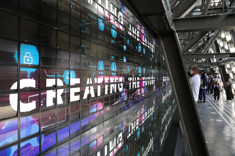 On the third floor, thousands of flipping screens are installed on a wall, identical to the split-flap displays found in train stations or airports. Pawan Singh / The National
