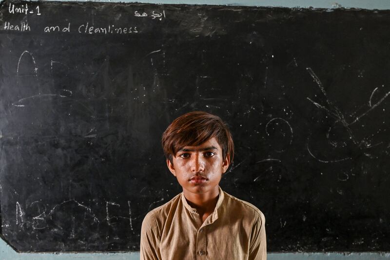 Nur Mohammad has taken refuge at a school after the rains in Jacobabad, Sindh Province. AFP