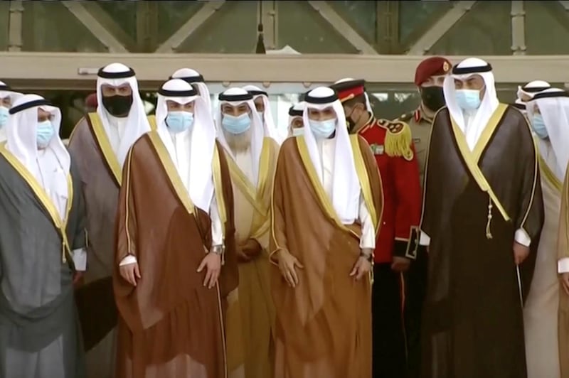 Sheikh Nawaf and officials after taking the oath of office as Emir at Parliament in Kuwait City. Reuters