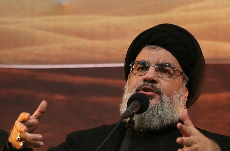 FILE - In this Nov. 3, 2014 file photo, Hezbollah leader Sheik Hassan Nasrallah addresses supporters ahead of the Shiite Ashura commemorations, in the southern suburb of Beirut, Lebanon. The leader of Hezbollah says U.S. sanctions against two lawmakers from his group are an offense to Lebanese state institutions which would need to defend themselves. Nasrallah, in a wide ranging interview late Friday, July 12, 2019, said such tactics won't sideline the group, because Hezbollah is a "big force" that represents large segments of society and has widely popular elected officials. (AP Photo/Hussein Malla, File)