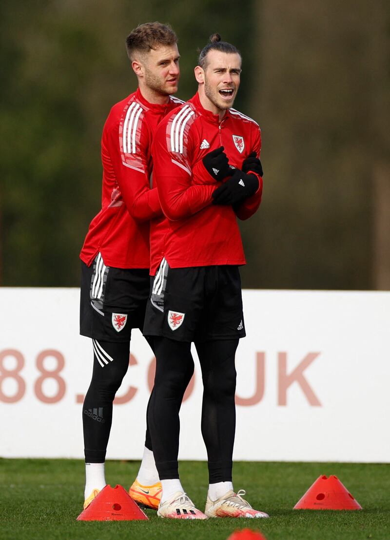 Gareth Bale and Joe Rodon during training. Reuters