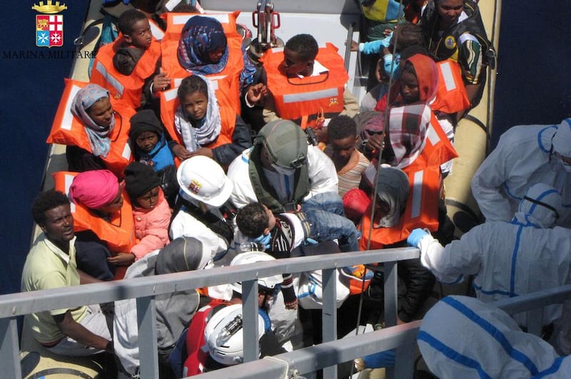 African migrants are rescued by the Italian navy from a ship in the Mediterranean. Marina Miltare / AFP Photo 