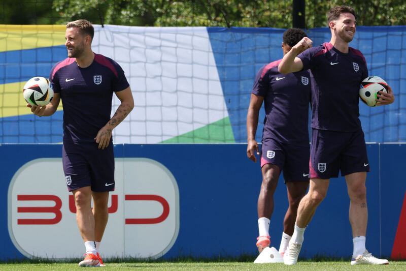 England's  Luke Shaw and Declan Rice during training. AFP