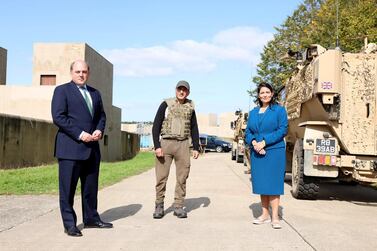 Defence Secretary Ben Wallace and Home Secretary Priti Patel with a member of the Armed Forces.Ministry of Defence