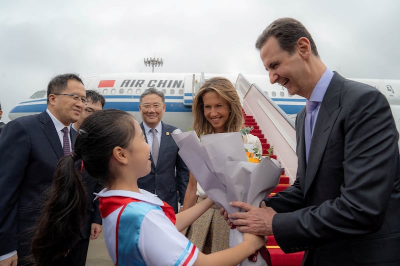 Mr Al Assad is welcomed in Hangzhou. Reuters