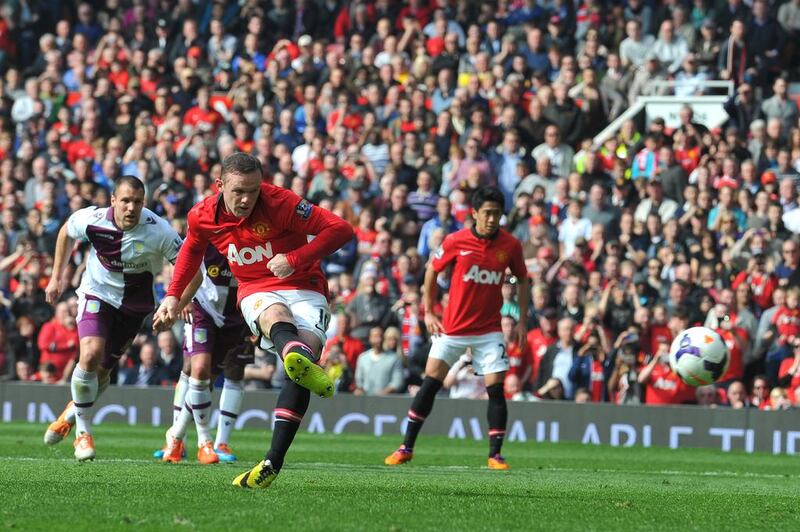 Manchester United striker Wayne Rooney scores from the penalty spot against Aston Villa. The club has linked up with Emirates NBD for a new savings account based on goals scored.