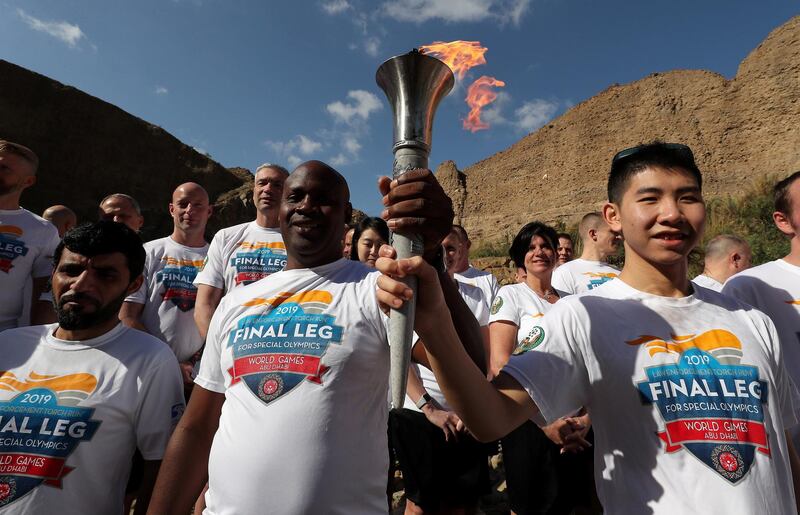 FUJAIRAH , UNITED ARAB EMIRATES , March 4 – 2019 :- Volunteers , officials and staff members of Wadi Al Wurayah with the Special Olympics torch “Flame of Hope” in Wadi Al Wurayah Waterfalls in Fujairah. ( Pawan Singh / The National )
For News/Online/Instagram/Big Picture. Story by Ruba
