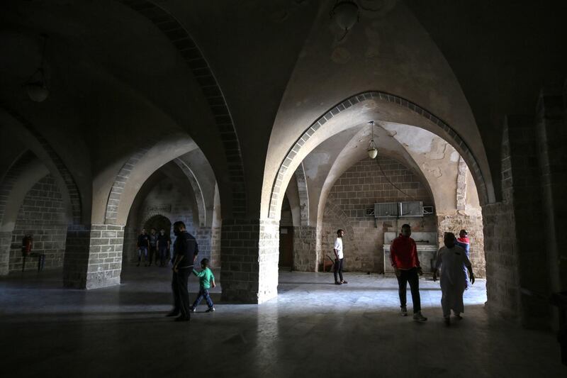 Palestinians leave Al Omari mosque in Gaza City.  EPA
