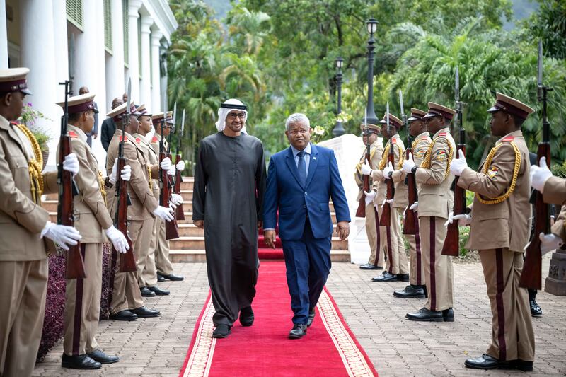President Sheikh Mohamed is welcomed by Wavel Ramkalawan, President of Seychelles, to the State House in Victoria. All photos: UAE Presidential Court