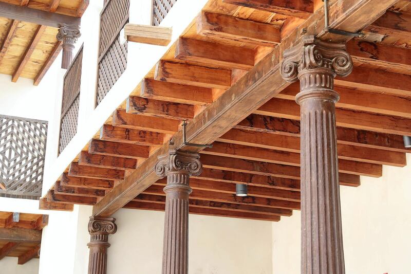 SHARJAH , UNITED ARAB EMIRATES , APRIL 24  – 2018 :- Wooden pillars at the Bait Al Naboodah which was built around 1845 is one of the Sharjah’s most stunning heritage buildings. Once the home of Obaid Al Naboodah , one of Sharjah’s most successful pearl merchants, the grand two storey building has undergone extensive renovation to return it to its former glory in the heart of old Sharjah. ( Pawan Singh / The National ) For Arts & Life. Story by Melissa Gronlund 