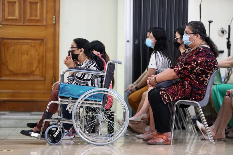 People attend the Easter Sunday Mass held at St Mary's Catholic Church in Dubai. Pawan Singh / The National