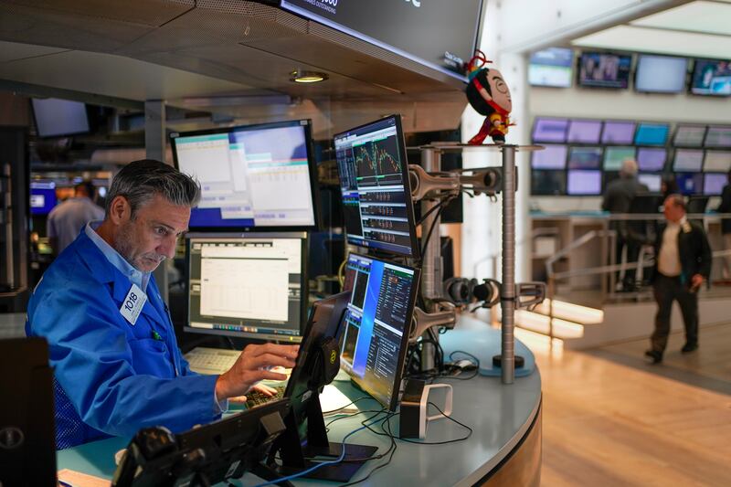 Traders work at the New York Stock Exchange. The key factor behind the turmoil in markets is the Fed, which has been rapidly tightening monetary policy to fight the highest inflation in decades. AP