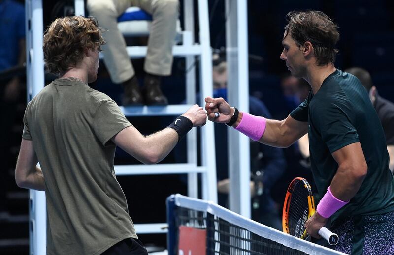 Rafael Nadal and Andrey Rublev after their match. EPA