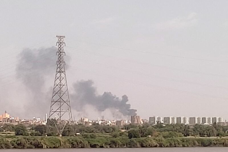 A picture taken from Omdurman shows smoke billowing north of Khartoum. AFP