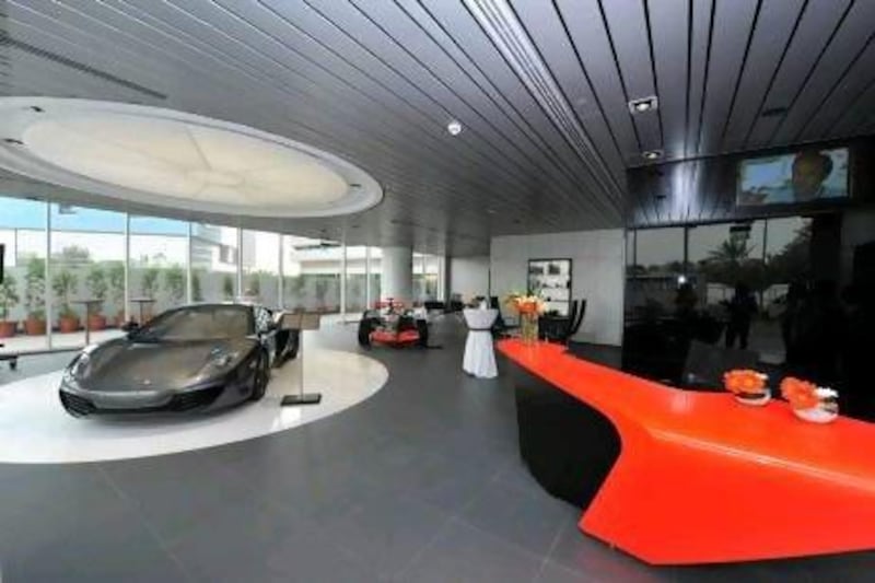 The new showroom houses an MP4-12C and Lewis Hamilton's 2007 F1 car.