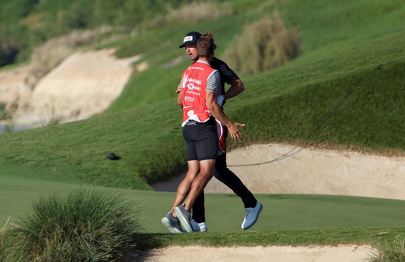 Victor Perez of France celebrates after his birdie on the 17th. Getty