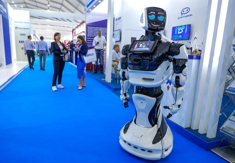 Abu Dhabi, United Arab Emirates, November 11, 2019.  
ADIPEC day 1 
Gallery images:
"Pretty Boy " the robot amazes visitors at the Promobot stand.
Victor Besa / The National
Section:  NA
Reporter:  Jennifer Gnana