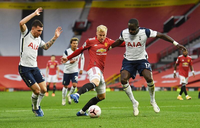 United's Donny van de Beek under pressure from Moussa Sissoko, right, and Pierre-Emile Hojbjerg, left. Reuters