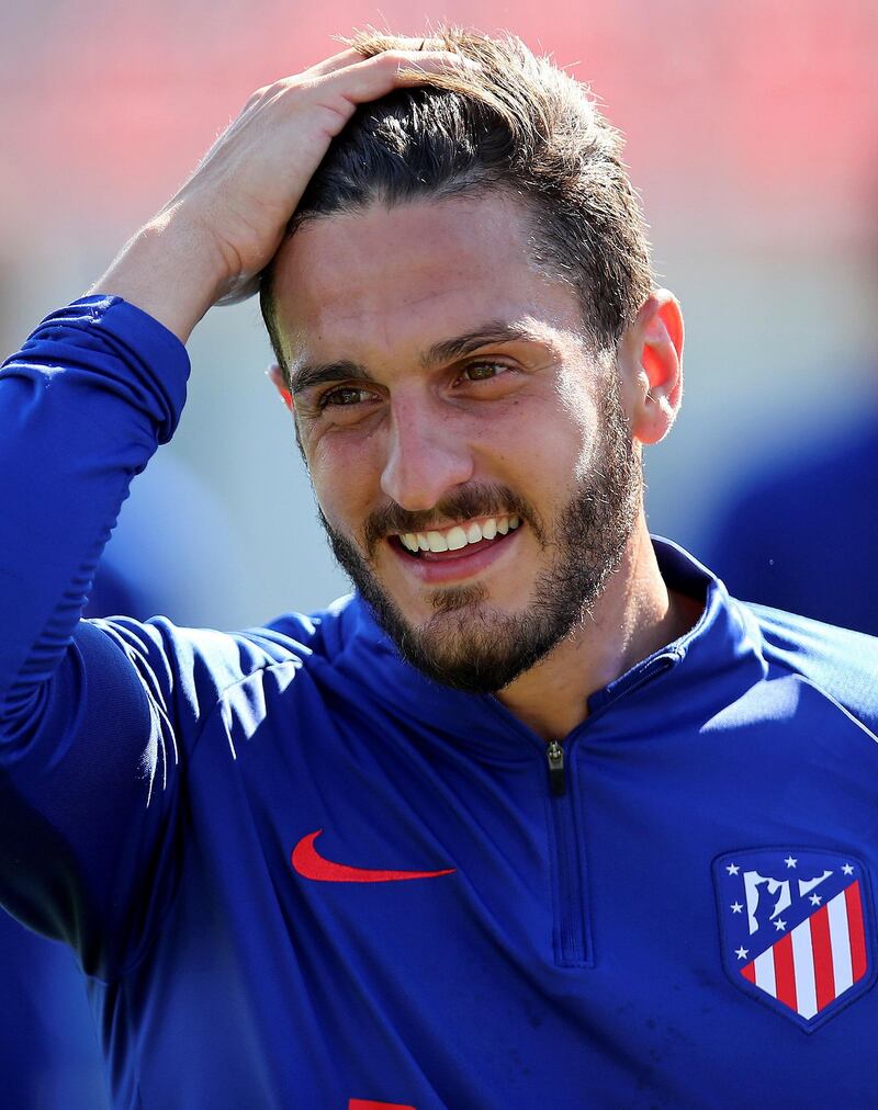 Koke attends a training session at Cerro del Espino sports complex. EPA