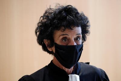 Isabelle Coutant-Peyre, lawyer for one of the defendant Ali Riza Polat, leaves the courtroom during a break on the opening day of the trial of the January 2015 Paris attacks against Charlie Hebdo satirical weekly, a policewoman in Montrouge and the Hyper Cacher kosher supermarket, at Paris courthouse, France, Steptember 2, 2020. The trial will take place from September 2 to November 10. REUTERS/Charles Platiau