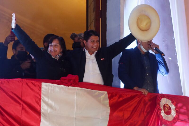 Leftist Pedro Castillo celebrates from the headquarters of the "Free Peru" party after Peru's electoral authority announced him as the winner of the presidential election, in Lima.