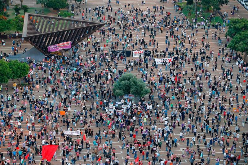 Protesters gather in Tel Aviv's Rabin Square on June 6, 2020, to denounce Israel's plan to annex parts of the occupied West Bank. AFP