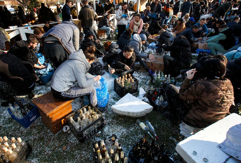 Residents prepare petrol bombs to defend the city, in Uzhhorod, Ukraine. Reuters