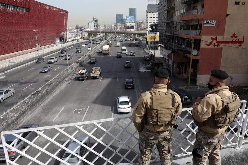 Lebanese army soldiers stand on a bridge in Jal el-Dib, Lebanon March 10, 2021. REUTERS/Mohamed Azakir