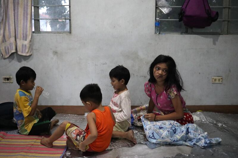 Children play and rest at the Delpan Evacuation Center after Typhoon Kammuri hit Metro Manila, Philippines. Reuters