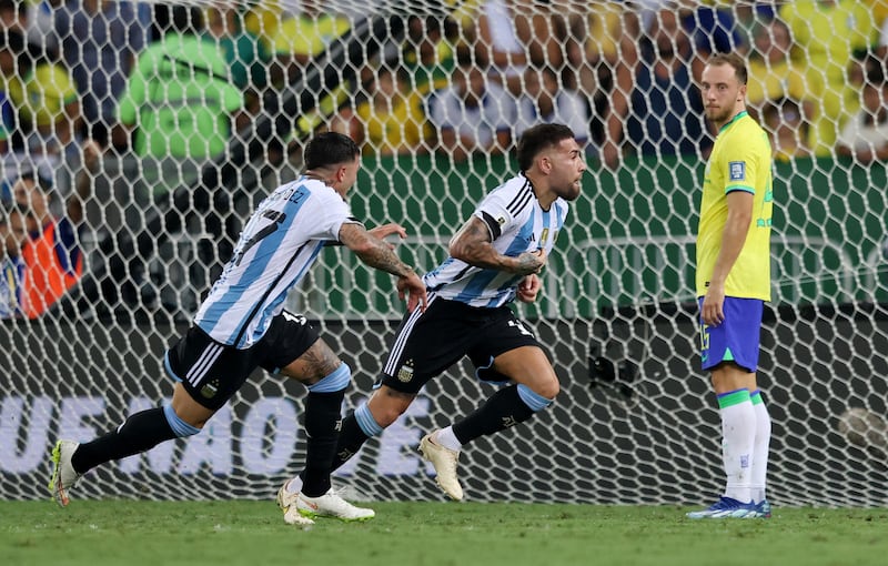 Nicolas Otamendi begins to celebrate after scoring for Argentina against Brazil. Reuters