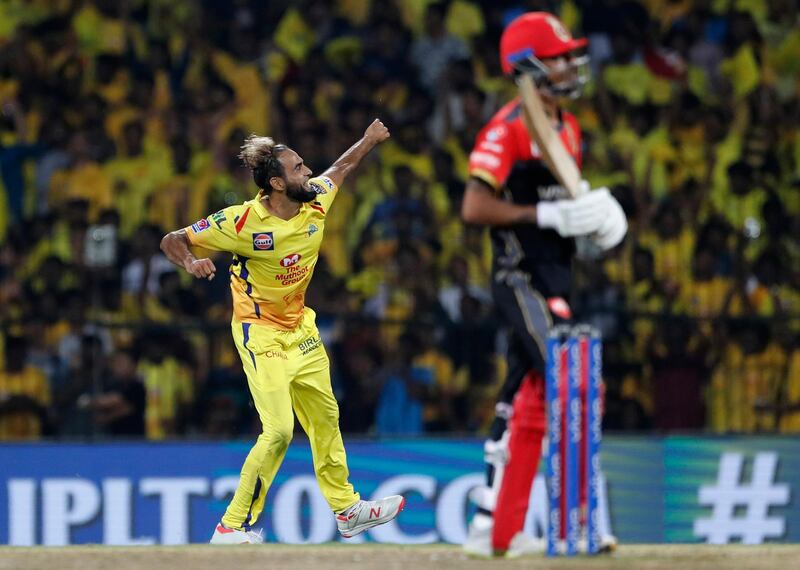 Chennai Super Kings' Imran Tahir, left, celebrates the dismissal of Royal Challengers Bangalore's Yuzvendra Chahal, right, during the VIVO IPL T20 cricket match between Chennai Super Kings and Royal Challengers Bangalore in Chennai, India. AP Photo