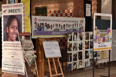 Profiles of women who work at Sheroes Hangout adorn the walls and pillars at the cafe. Photo: Sheroes Hangout