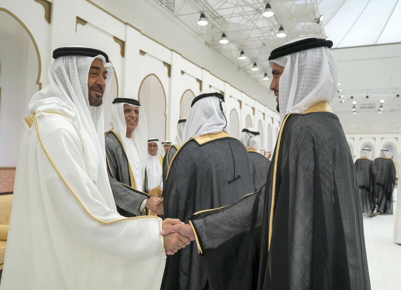 ADHAN, RAS AL KHAIMAH, UNITED ARAB EMIRATES - March 13, 2018: HH Sheikh Mohamed bin Zayed Al Nahyan, Crown Prince of Abu Dhabi and Deputy Supreme Commander of the UAE Armed Forces (L), greets a groom who participated in a mass wedding reception for HH Sheikh Mohamed bin Saud bin Saqr Al Qasimi, Crown Prince and Deputy Ruler of Ras Al Khaimah (not shown), at Mohamed bin Zayed, Al Bayt Mitwahid wedding hall. Seen with HH Sheikh Saud bin Saqr Al Qasimi, UAE Supreme Council Member and Ruler of Ras Al Khaimah (2nd L).

( Mohamed Al Hammadi / Crown Prince Court - Abu Dhabi )
---