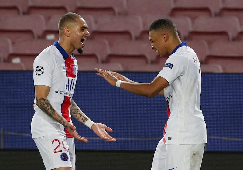 Paris St Germain's Kylian Mbappe celebrates scoring their fourth goal with teammates. Reuters