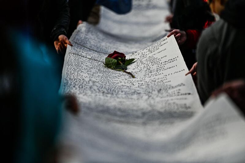 The names of victims of police brutality are written on a banner on display at the 'I Can’t Breathe – Silent March for Justice' protest outside Hennepin County Government Center, Minneapolis, US. The trial of former police officer Derek Chauvin, charged with murdering African American man George Floyd, begins there on March 8. AFP