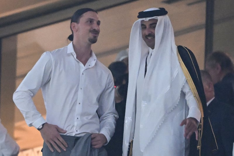 Zlatan Ibrahimovic with Emir of Qatar Tamim bin Hamad Al Thani at the Lusail Stadium. AFP